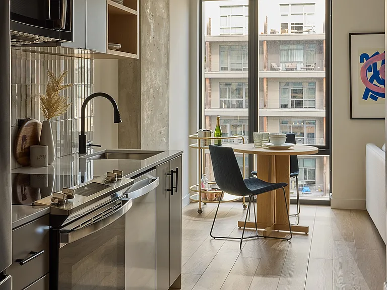 Quartz Countertops and Tile Backsplashes