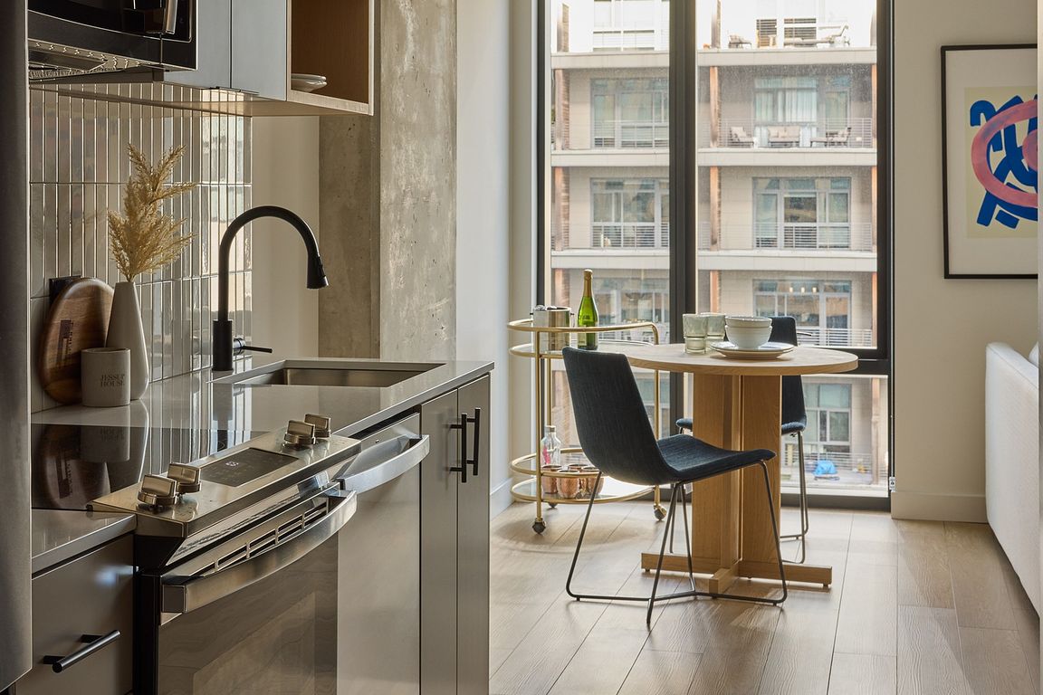Quartz Countertops and Tile Backsplashes