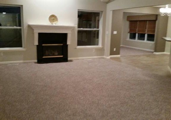 Living room, main floor, and sunroom/dining room