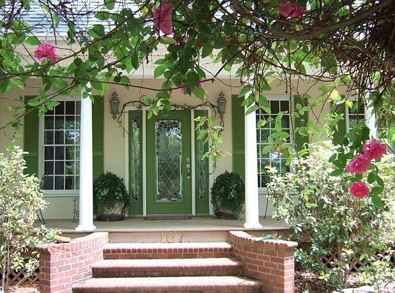 Entry through arbor. 