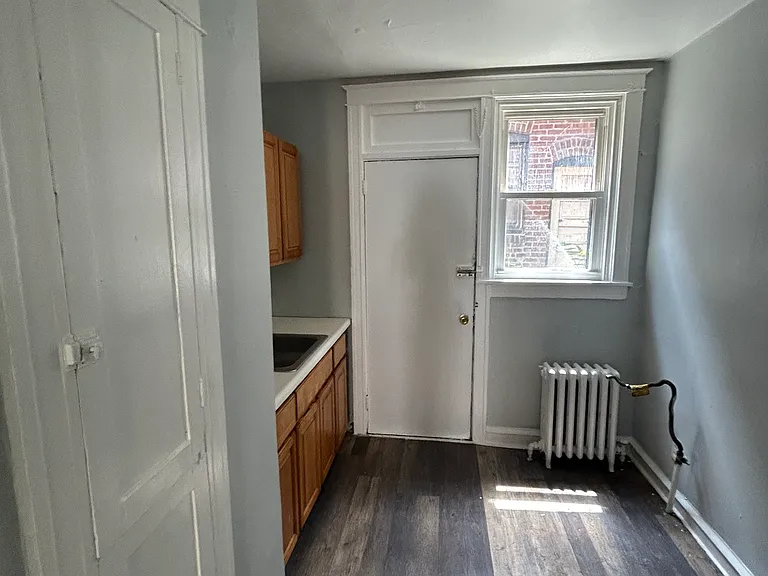 Kitchen (closet storage on left and right)