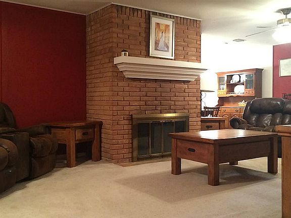 The living room is large and includes a wood-burning fireplace with gas option and a great mantle!