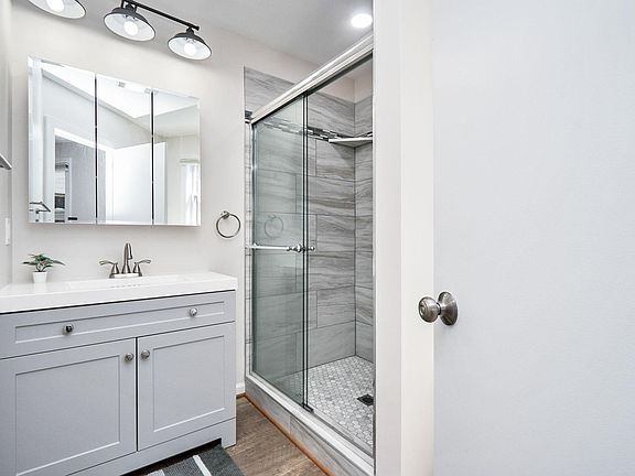 Bathroom with LOTS of lights and custom tile work.