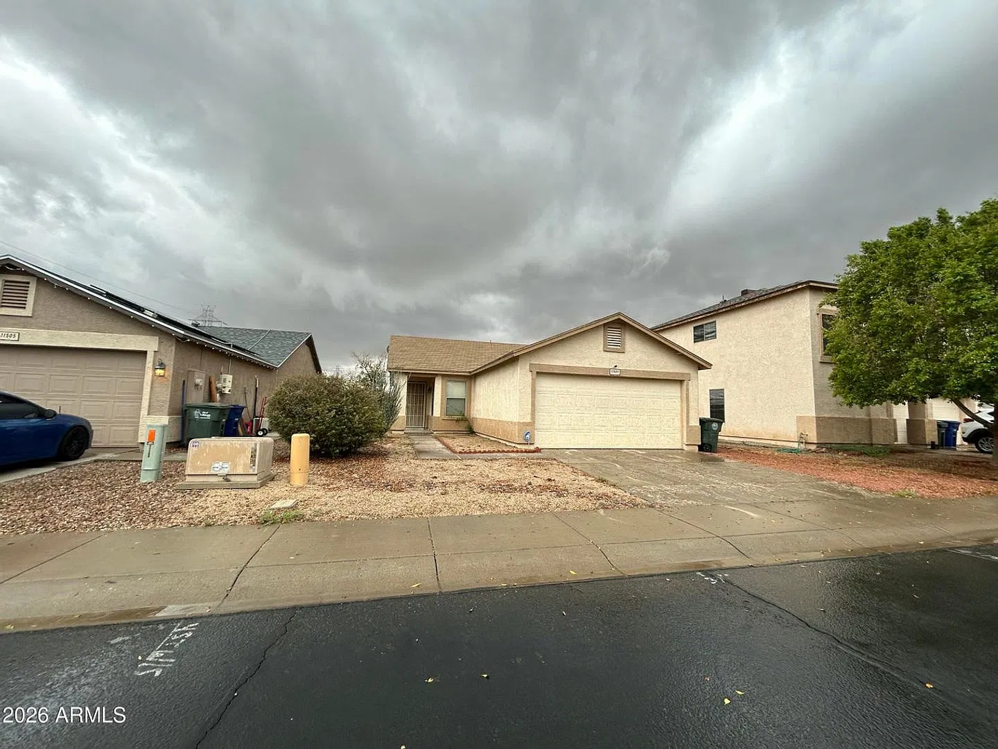 El Mirage Home with Tile Flooring Throughout — Photo 1