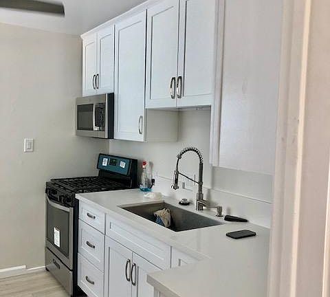 All new neutral white kitchen