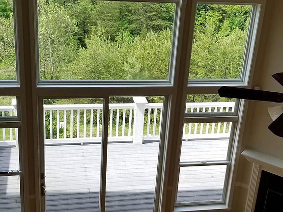 View of main level living area from the upper level loft.