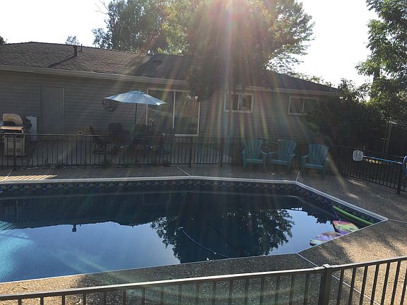 On the hill above the pool.