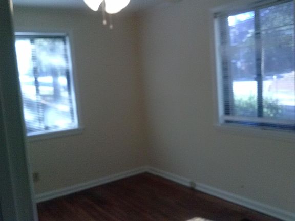 Master bedroom with two large windows and lots of closet spa
