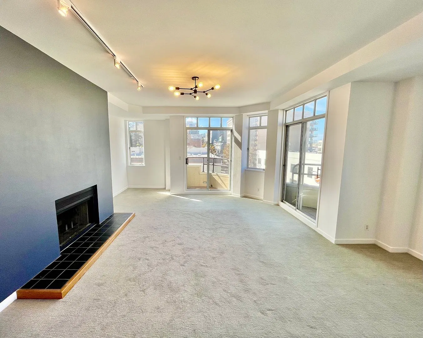 Bright, Updated Condo with In-Unit Laundry, Dual Balconies & Parking — Photo 1