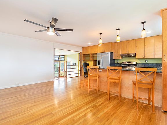 Real oak floors, ceiling fans and lots of light.