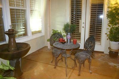 Gated front courtyard-french doors go to attached casita