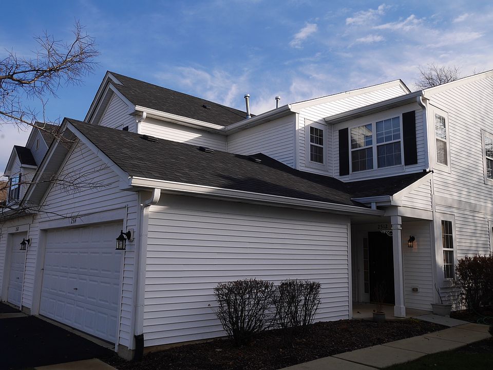 2nd floor unit with attached 2 car garage
