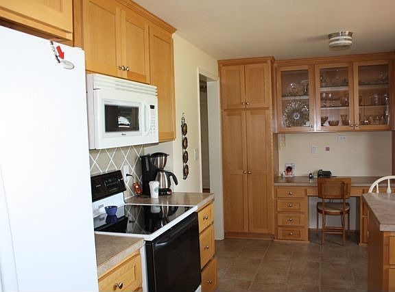 New cabinets, counters, flooring
