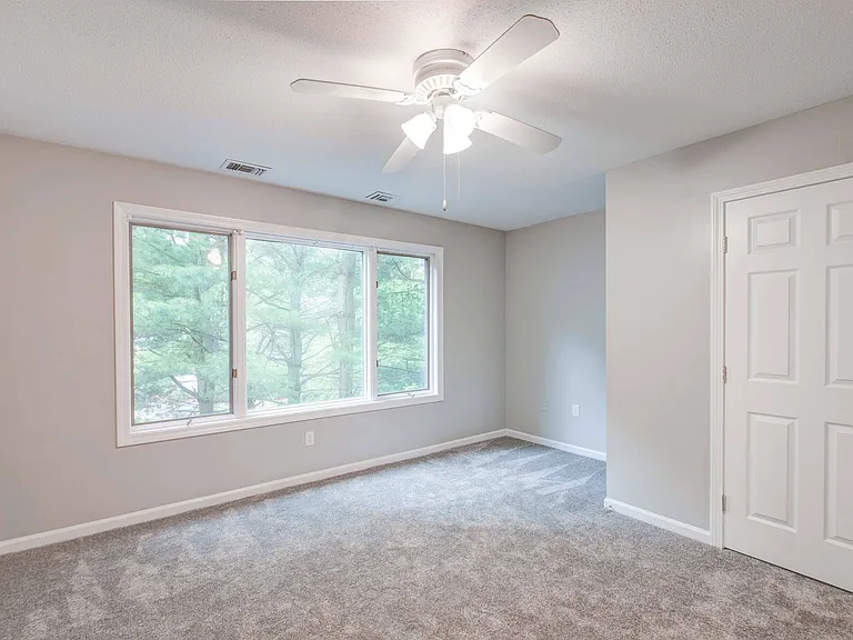 Bedroom with large windows