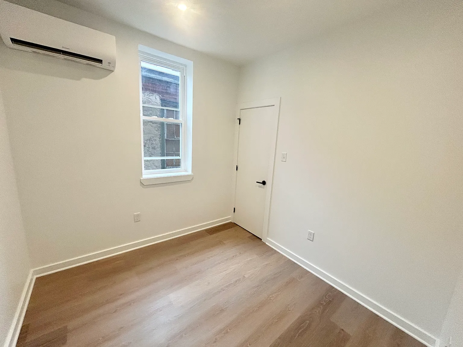 Brand-New 2-Bedroom Apartment with Central Air and In-Unit Laundry — Photo 4
