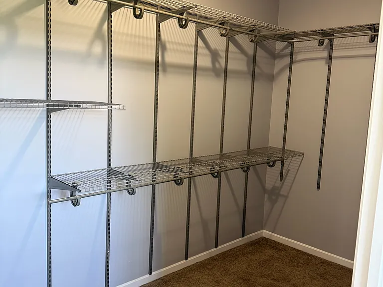 Walk-in closet primary bathroom