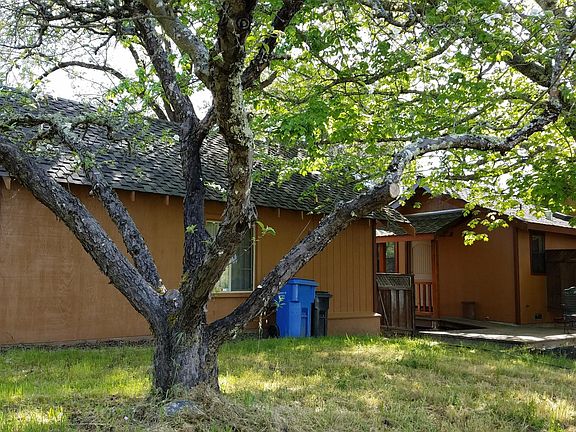 350 s.f. garage /storage with door opener and backyard deck.