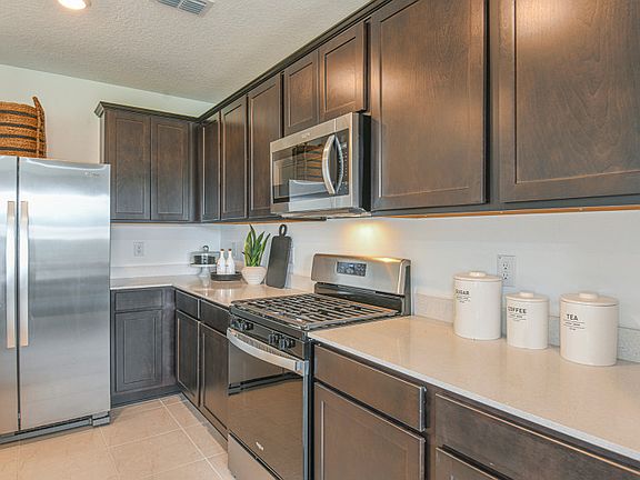 Ample Cabinet and Countertop Space