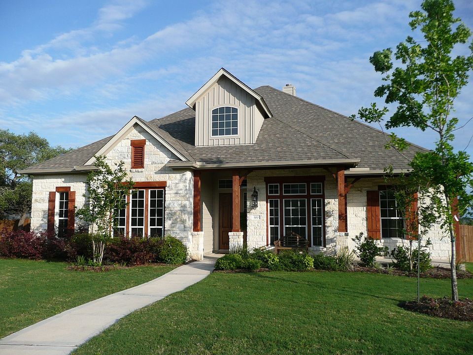 Cedar trim on Texas limestone