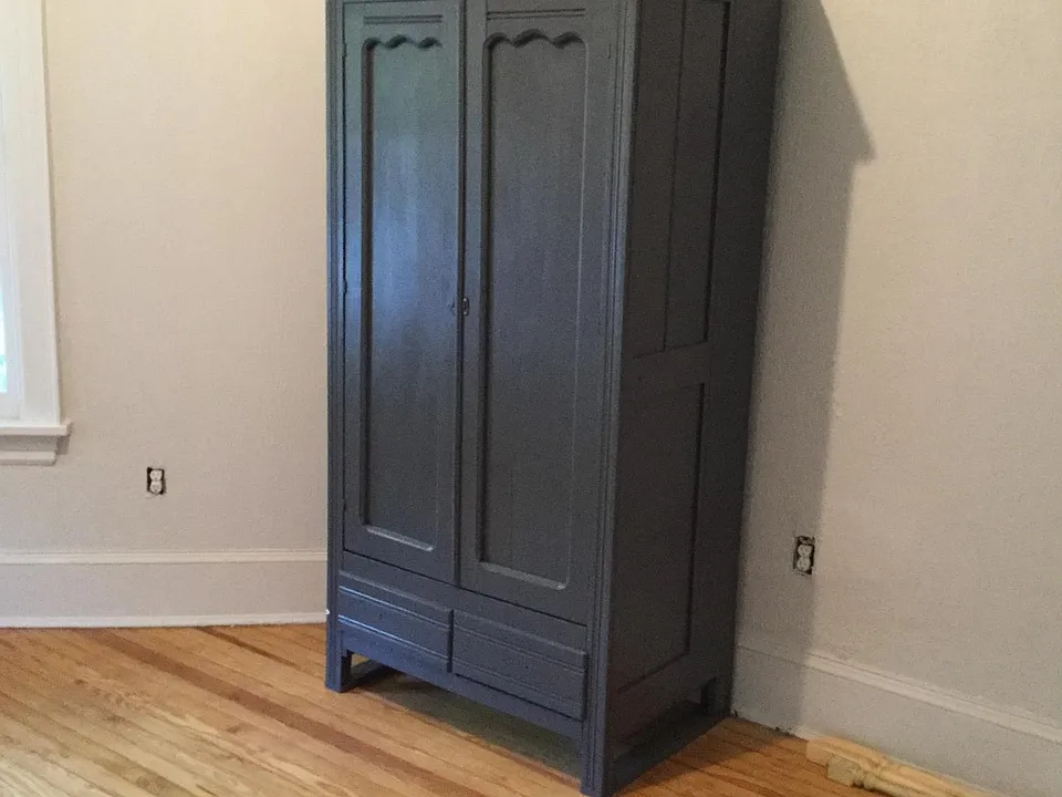 Armoire in one of the 3 bedrooms