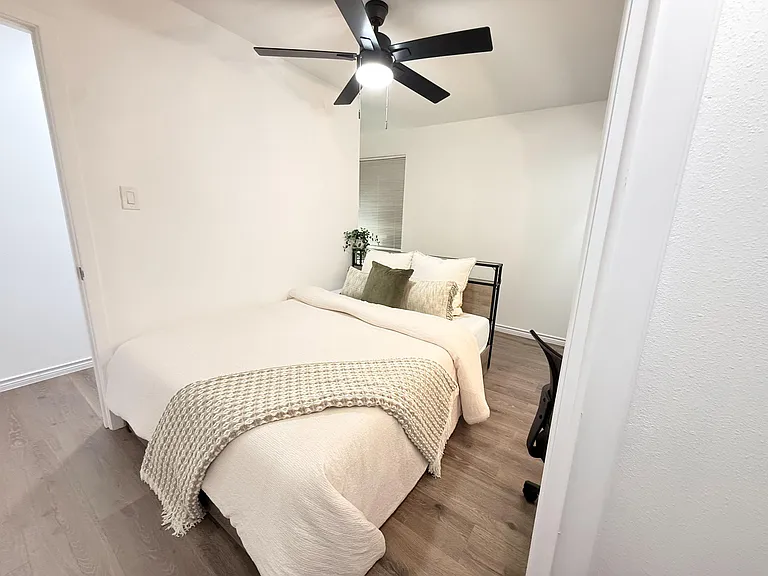 The bed has a charging station with LED lights and under bed storage drawers.