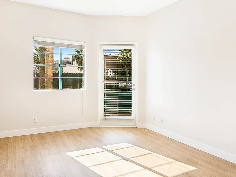 Bedroom with Hard Surface Flooring and Balcony