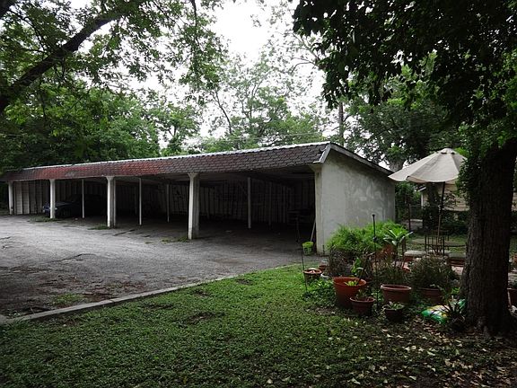 Carport behind building