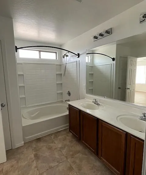 Ensuite master bath with duel sinks.