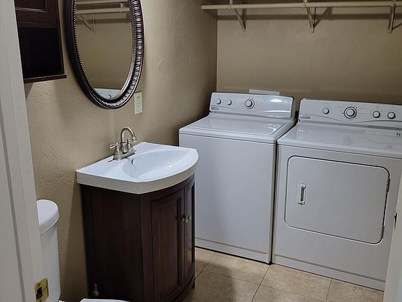 Half bath and laundry area