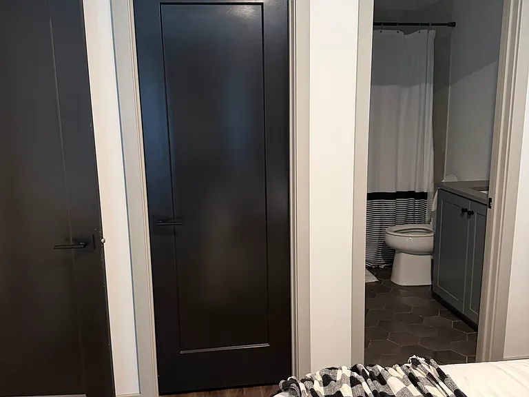 First floor bedroom, bathroom, and closet