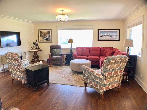 Large open living room with lots of natural light. The open floor plan is perfect for large gatherings of an evening with friends. The heart of Old Town is easy walking distance so who needs an Uber?