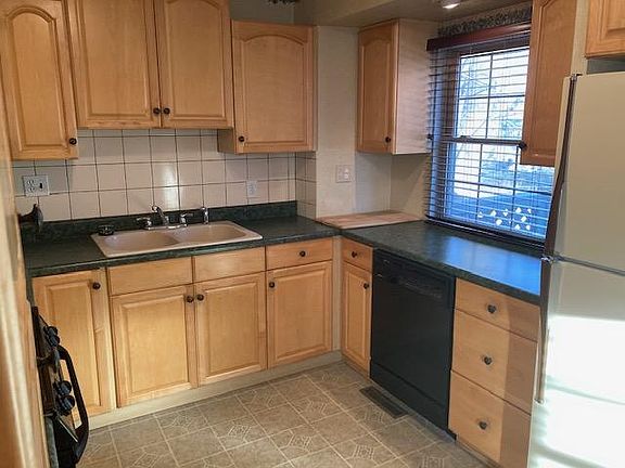 Kitchen with dishwasher.