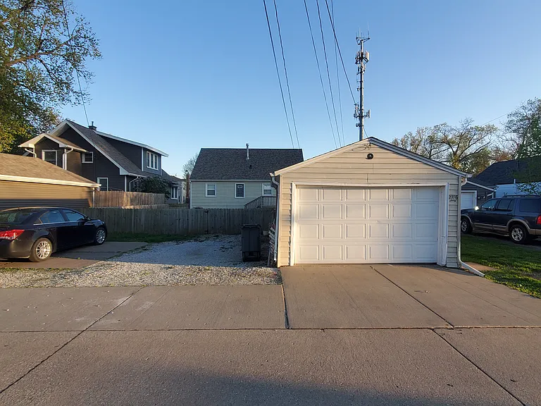 Alley View - Parking area and garage