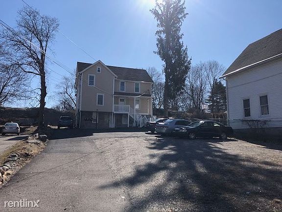 Denison 3 Triplex wiht parking area