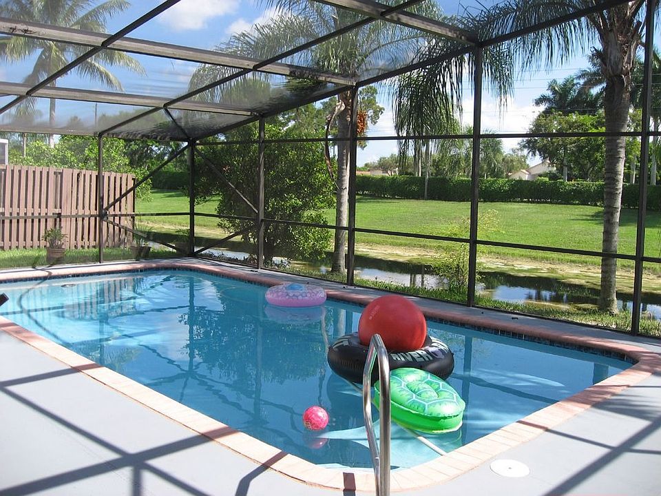 Large Pool Overlooking Water