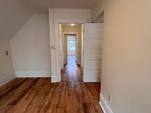 Living room looking into hallway to bedrooms