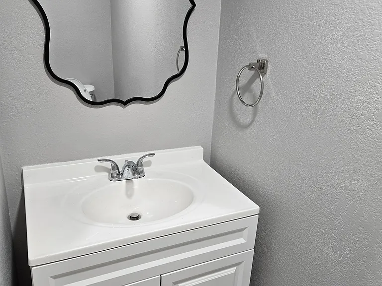 Media Room Bath Vanity and Mirror