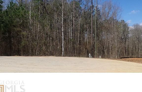 Wooded 7.2 acres to left of fire hydrant