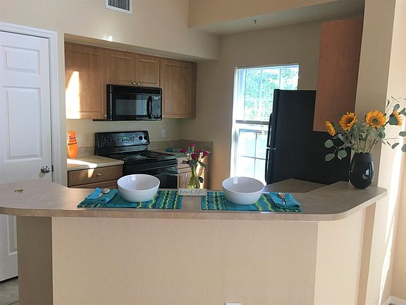 Fully applianced, light kitchen.