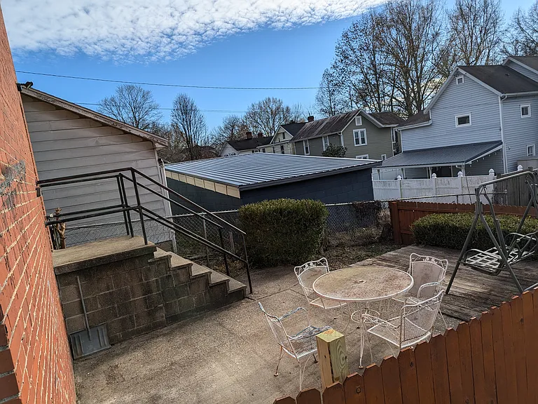 Back yard from the entrance gate.