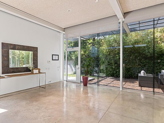 A feng shui consultant advised the owner on how to select and arrange the furniture in a way that maximized the positive flow of energy into the home, ensuring that this is a place of peace and restoration for you.