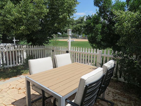 front patio dining area with park view