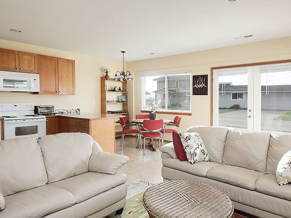 Living/family room, kitchen, and the eating nook