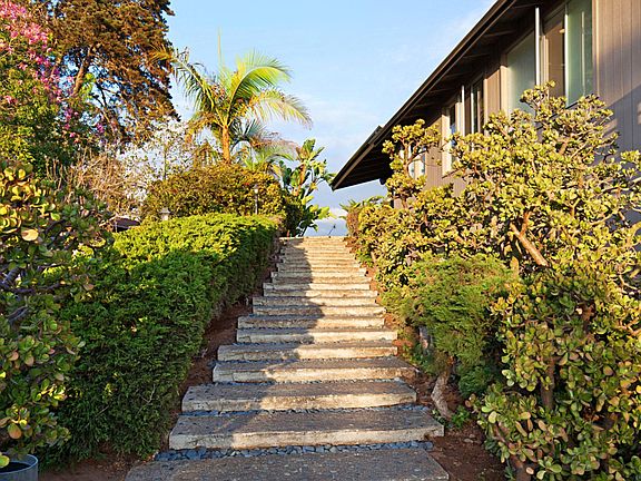 stairs leading to front door upper