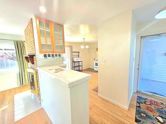 Light and bright entryway featuring smart storage options.