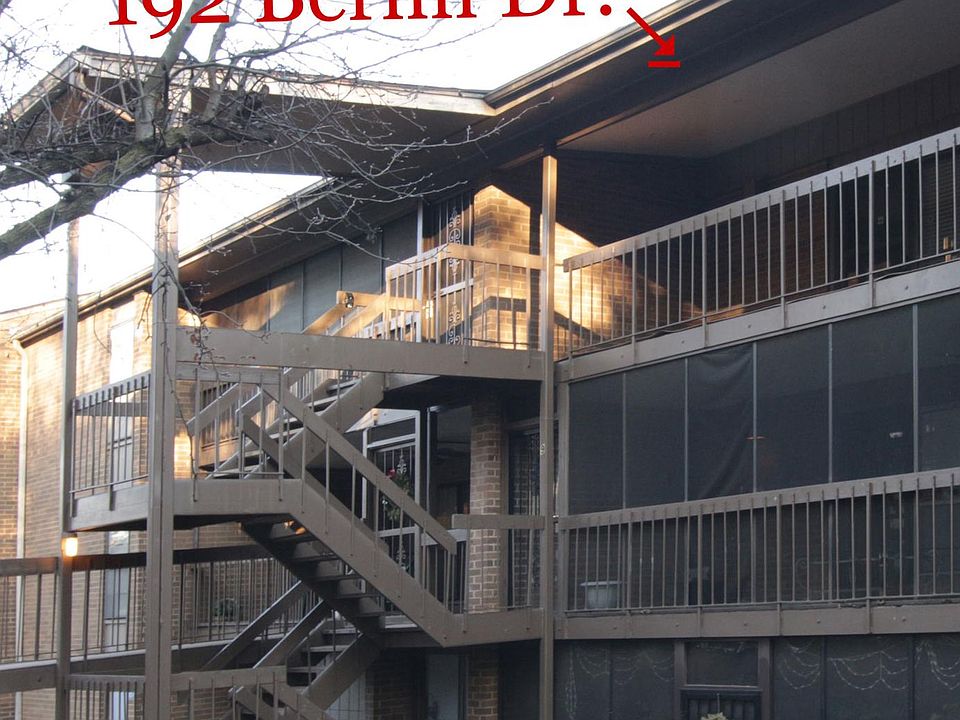 Condo is top right, parking is to left at second floor level.