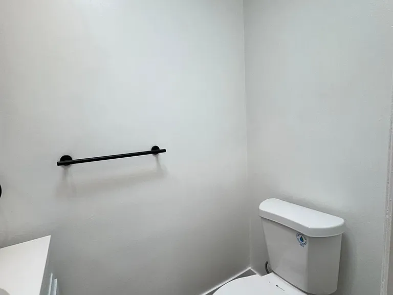 Half bathroom in hallway