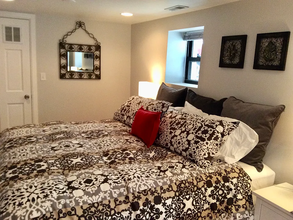 King bed. Large closet with dresser through the door at the left