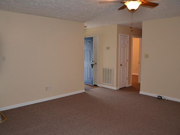 Living Room w/front door & hall entrance