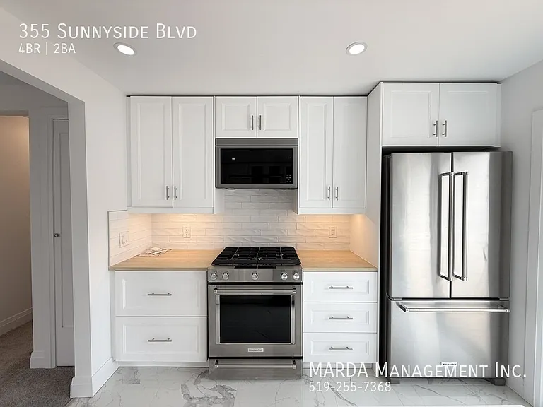 355 Sunnyside Blvd — Photo 14